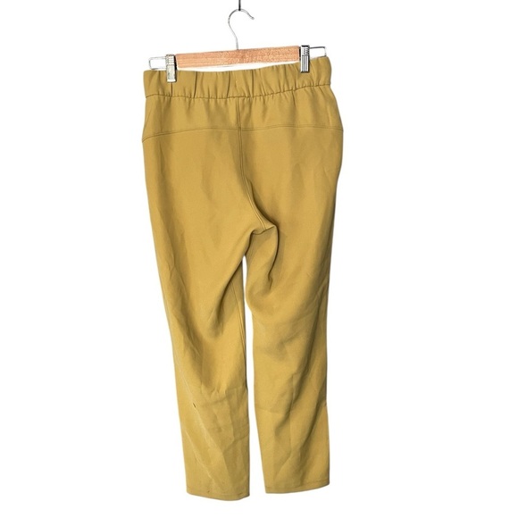 Lululemon On the Fly 7/8 Pant *Woven Vintage Gold - Picture 3 of 10